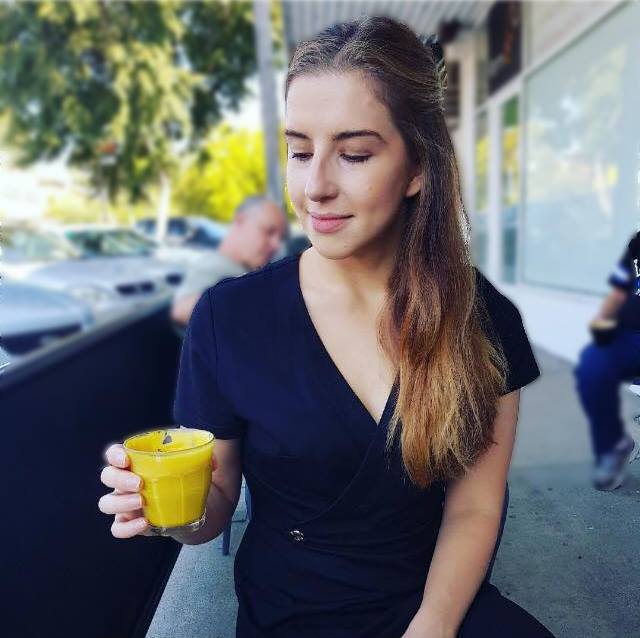 drinking golden lattes in ergonaut wrap dress